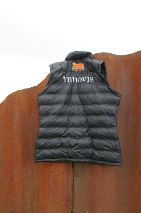 Livestock farming clothing hung on a fence